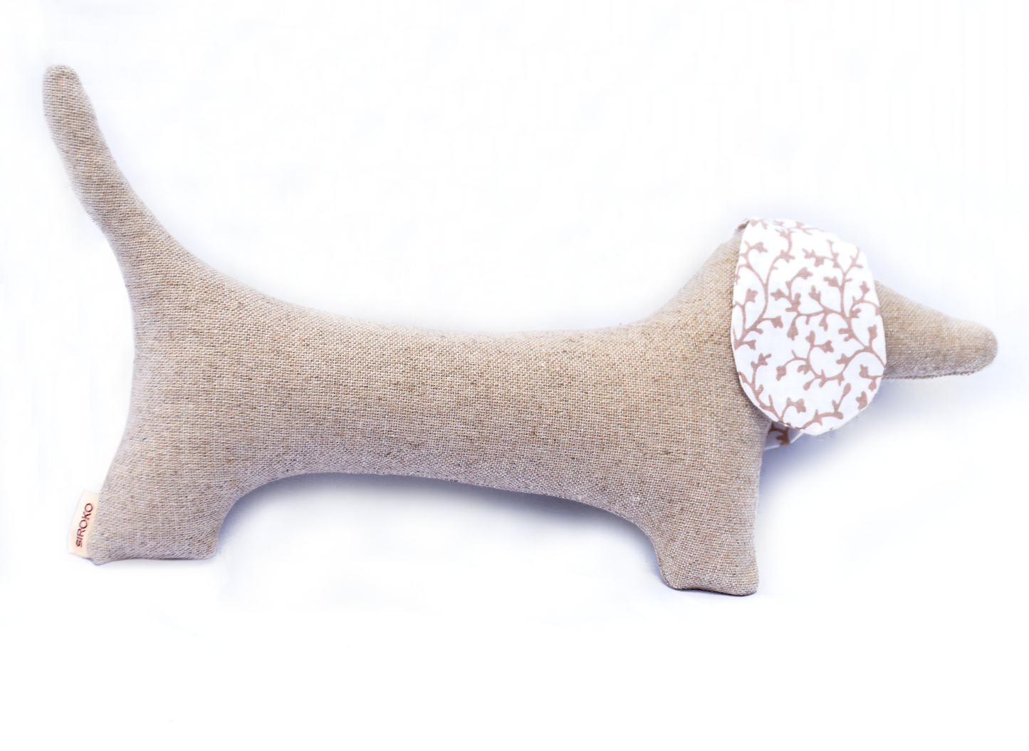 CHIEN TECKEL, À LA FOIS JOUET ET OBJET DÉCORATIF